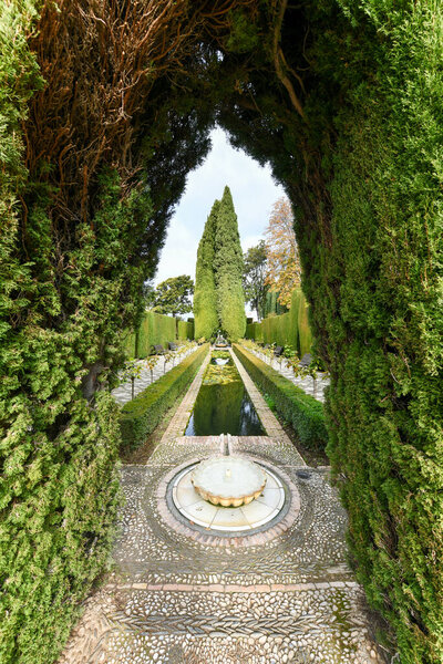Beautiful Scenery of the Garden at Alhambra Palace in Granada, Spain.