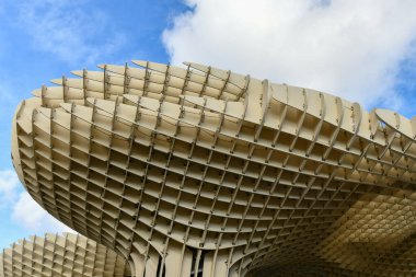Seville, Spain - Dec 8, 2021: Metropol Parasol wooden structure located in the old quarter of Seville, Spain.