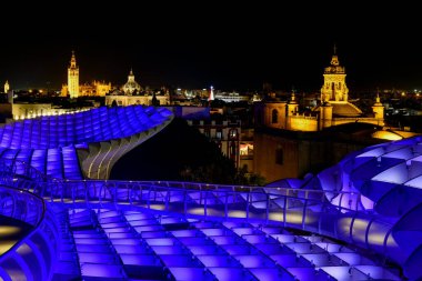 Seville, Spain - Dec 8, 2021: Metropol Parasol wooden structure located in the old quarter of Seville, Spain.