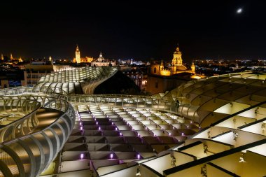 Seville, Spain - Dec 8, 2021: Metropol Parasol wooden structure located in the old quarter of Seville, Spain.