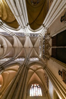 Toledo, Spain - Dec 10, 2021: Interior of the Santa Iglesia Catedral Primada de Toledo Roman Catholic church and The Primate Cathedral of Saint Mary in Spain.
