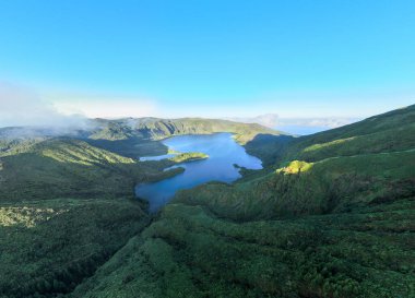 Beautiful aerial panoramic view of Lagoa do Fogo lake in Sao Miguel Island, Azores, Portugal. clipart