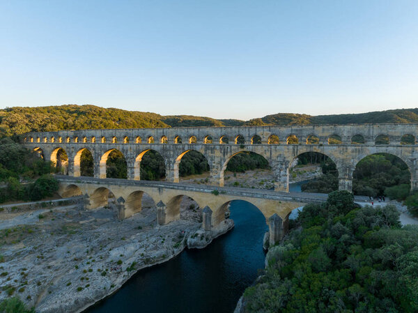 View of the Pont Du Gard, an ancient Roman aqueduct in France, Occitanie, Pont du Gard, Provence, Gard, Languedoc-Roussillon.