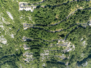 Aerial view of a mountain serpentine road in Kotor, Montenegro clipart