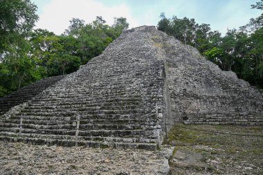 Nohoch Mul Pyramid at the archeological site of Coba in Mexico. clipart