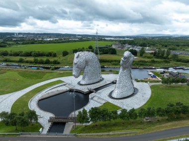 The Kelpies are a pair of monumental steel horse-heads between the Scottish towns of Falkirk and Grangemouth. clipart