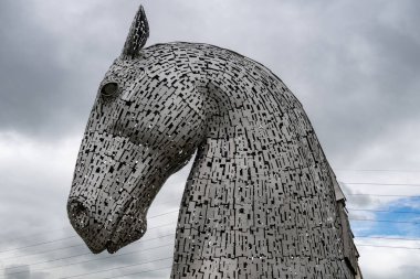 The Kelpies are a pair of monumental steel horse-heads between the Scottish towns of Falkirk and Grangemouth. clipart