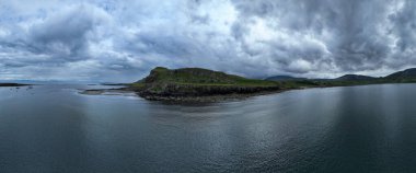 Aerial view of a small Peninsula An corran beach near Staffin Bay, Isle of Skye, Scotland. clipart