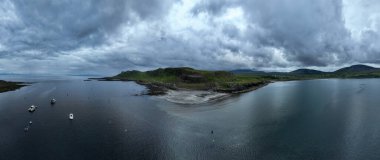 Aerial view of a small Peninsula An corran beach near Staffin Bay, Isle of Skye, Scotland. clipart