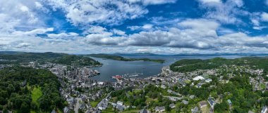 Aerial view of McCaig Tower overlooking Oban Bay and the Isle of Mull, Scotland. clipart