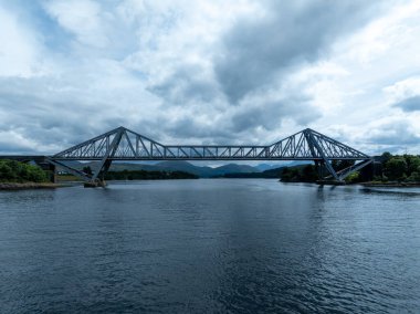 Aerial view of the Connel Bridge near Oban, Scotland. Connel Bridge is a cantilever bridge that spans Loch Etive at Connel in Scotland. clipart