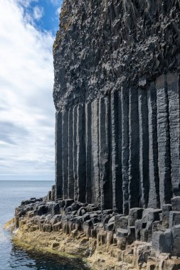 Fingal cave on Staffa island on the coast of Scotland. clipart