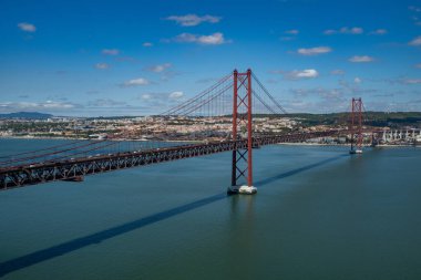 The 25 de Abril Bridge is a bridge connecting the city of Lisbon to the municipality of Almada on the left bank of the Tejo river, Lisbon clipart