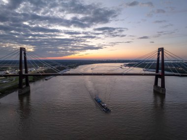 Aerial view of the Hale Boggs Memorial Bridge in Luling, South Louisiana at dusk. clipart