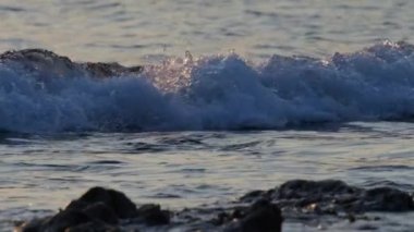 Slow motion and close up of big  tube wave sweeps, Great Barrier Reef, Australia.