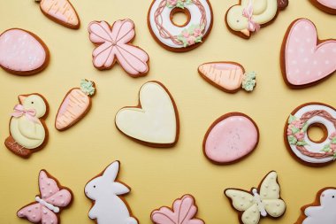 Easter cookies background flat lay. Aesthetics baked glazed cute symbols of Easter. Spring easter card.