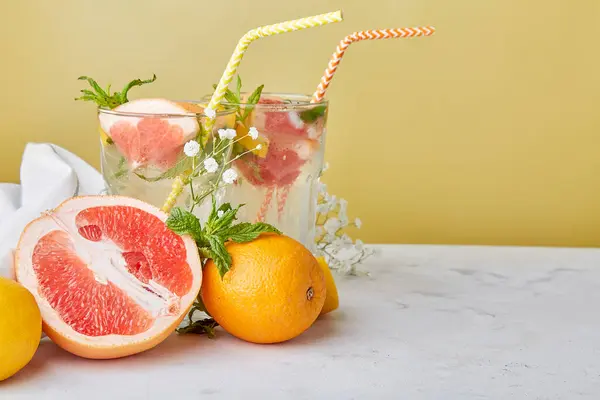 Aesthetic summer cocktails with citrus fruits. Vitaminized detox water. Low alcohol, zero proof drinks