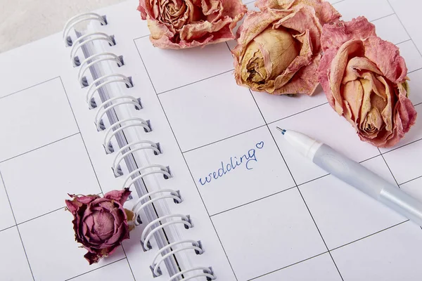 stock image Love in the Details: - Wedding Planning Photoshoots - calendar and flowers, wedding checklist.