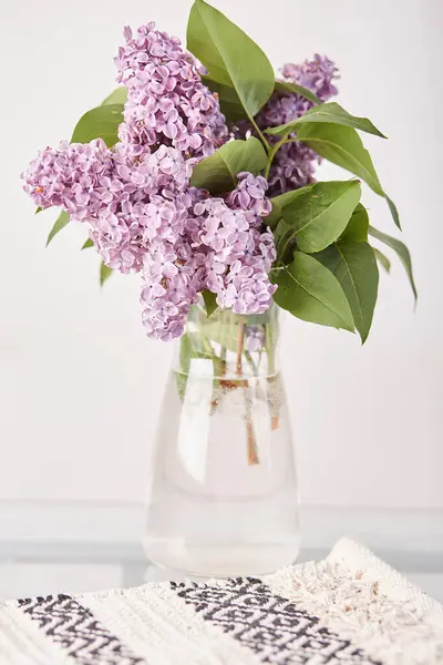 Lilac flowers bouquet, cozy aesthetics home.