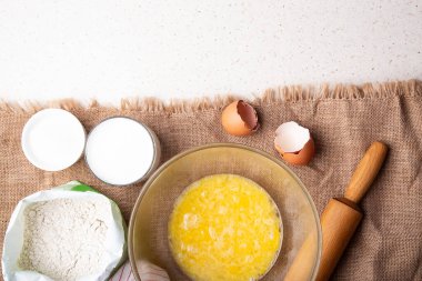 Rustic Baking - orange Peel Enhancing the Flavor of Home Baked Goods. Recipe with eggs, wholegrain flour, sugar and kefir clipart