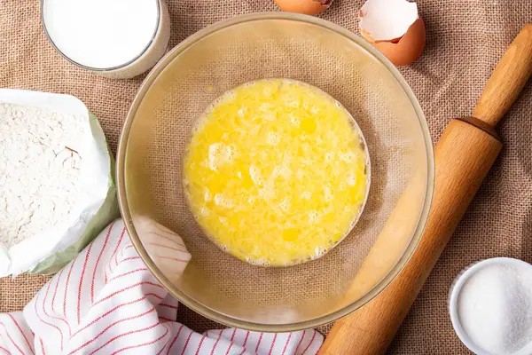 stock image Wholesome Ingredients -crafting a Batter with Citrus Accent. Recipe with eggs, wholegrain flour, sugar and kefir.