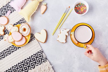 Cozy kid snack time. Kid approved cookies. Tradition cookies decoration by kid flat lay. clipart