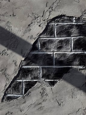 Açığa çıkmış tuğlalı ve klasik dekorlu Grunge gri duvarı. Beton tonlar, kırmızı tuğlalar ve arka plan, tasarım veya ruh hali için retro dekoratif elementlerle desenli endüstriyel yüzey