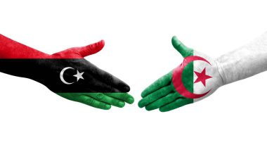 Cezayir ve Libya bayrakları arasındaki el sıkışma ellerinde resmedilmiş şeffaf bir görüntü.