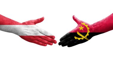 Angola ve Avusturya bayrakları arasındaki el sıkışma ellerinde resmedilmiş şeffaf bir görüntü.