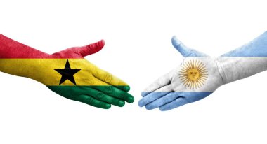 Ellerinde Arjantin ve Gana bayrakları arasında el sıkışma, izole şeffaf görüntü.