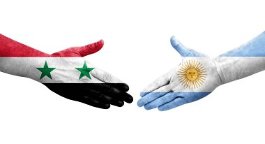Ellerinde Arjantin ve Suriye bayrakları arasında el sıkışma, izole şeffaf görüntü.