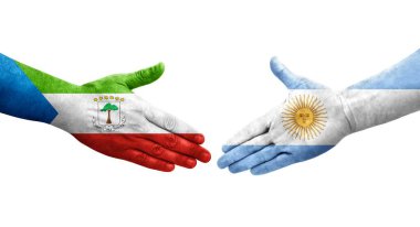 Arjantin ve Ekvator Gine bayrakları arasındaki el sıkışma, izole şeffaf görüntü.