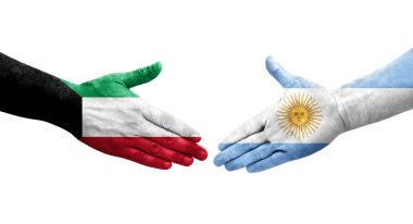 Ellerinde Arjantin ve Kuveyt bayrakları arasında el sıkışma, izole şeffaf görüntü.