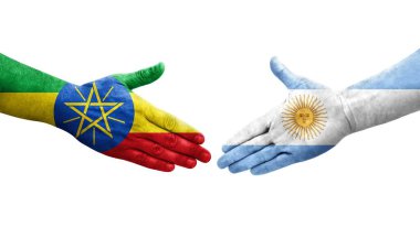 Ellerinde Arjantin ve Etiyopya bayrakları arasında el sıkışma, izole şeffaf görüntü.