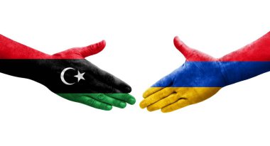 Ellerinde Ermenistan ve Libya bayrakları arasında el sıkışma, izole saydam görüntü.
