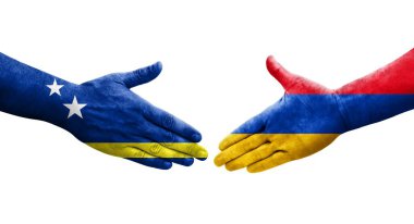 Ellerinde Ermenistan ve Curacao bayrakları arasında el sıkışma, izole şeffaf görüntü.