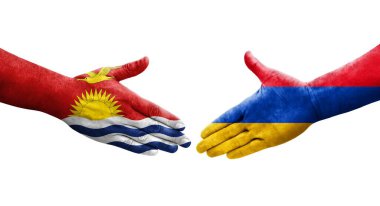 Ellerinde Ermenistan ve Kiribati bayrakları arasında el sıkışma, izole şeffaf görüntü.