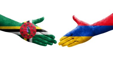 Ellerinde Ermenistan ve Dominika bayrakları arasında el sıkışma, izole şeffaf görüntü.
