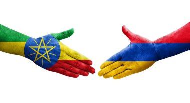 Ellerinde Ermenistan ve Etiyopya bayrakları arasında el sıkışma, izole şeffaf görüntü.