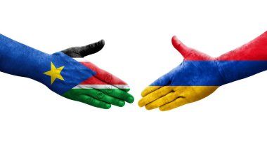 Ellerinde Ermenistan ve Güney Sudan bayrakları arasında el sıkışma, izole şeffaf görüntü.