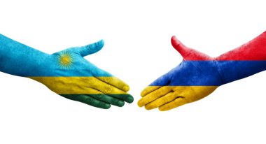 Ermenistan ve Ruanda bayrakları arasındaki el sıkışma ellerinde izole şeffaf görüntü.