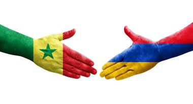Ellerinde Ermenistan ve Senegal bayrakları arasında el sıkışma, izole şeffaf görüntü.