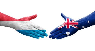 Avustralya ve Lüksemburg bayrakları arasında el sıkışma, izole şeffaf görüntü.