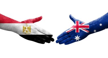 Ellerinde Avustralya ve Mısır bayrakları olan el sıkışma, izole şeffaf görüntü.