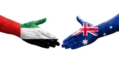 Avustralya ve BAE bayrakları arasındaki el sıkışma, izole saydam görüntü.