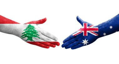 Ellere boyanmış Avustralya ve Lübnan bayrakları arasındaki el sıkışma, izole şeffaf görüntü.