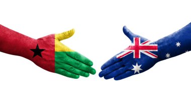 Avustalya ve Gine Bissau bayrakları arasındaki el sıkışma, izole şeffaf görüntü.