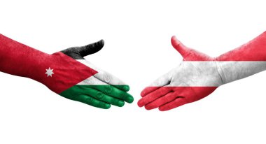 Ellerinde Avusturya ve Ürdün bayrakları arasında el sıkışma, izole şeffaf görüntü.