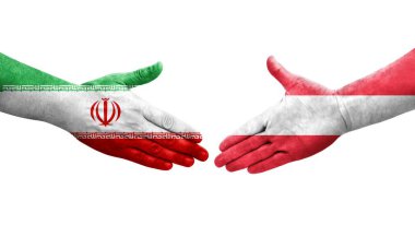 Ellerinde Avusturya ve İran bayrakları arasında el sıkışma, izole şeffaf görüntü.