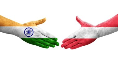 Ellerinde Avusturya ve Hindistan bayrakları arasında el sıkışma, izole şeffaf görüntü.